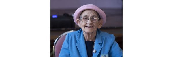 Lauretta Goldsmith with pink hat and blue jacket 600